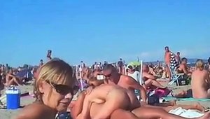 Rides a hard dick at the beach next to female Sunny Leone